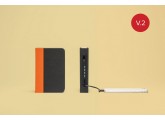 Lampara-libro-mini lumio+ naranja/negro